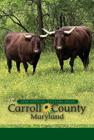 Image of cover page of the visitors guide 2026, with 2 Red Devin Oxen.